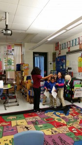 Mariela, an eighth grader, says hello to third grade students at Breakthrough South Magnet School. CREDIT: Casey Quinlan