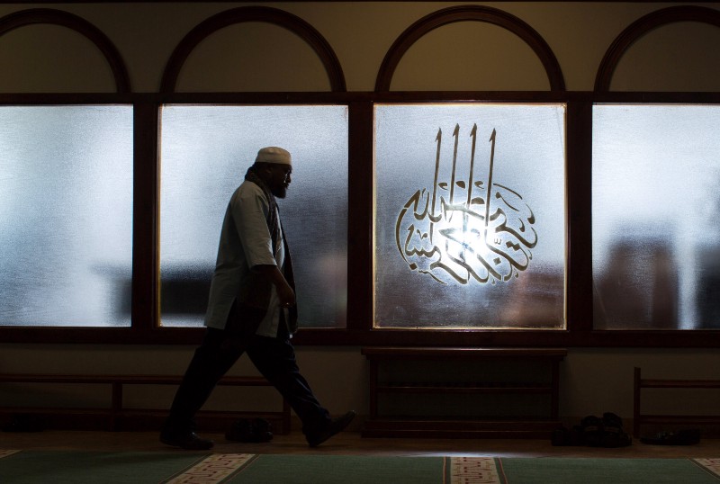Imam Suleimaan Hamed, the leader of the Atlanta Masjid of Al Islam mosque, walks through the mosque, in Atlanta. CREDIT: AP PHOTO/BRANDEN CAMP
