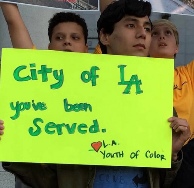 Youth demonstrate during a press conference Friday. CREDIT: Center for Biological Diversity