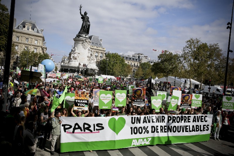 The crowd walks at People’s Climate March Paris, on Sunday, September 21, 2014 in Paris. Organizers had planned a similar march for before and after the U.N. talks in a few weeks. CREDIT: THOMAS PADILLA/AP IMAGES FOR AVAAZ