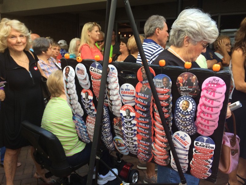 Crowds of Floridians buy buttons outside of Dr. Ben Carson’s book signing. CREDIT: Alice Ollstein