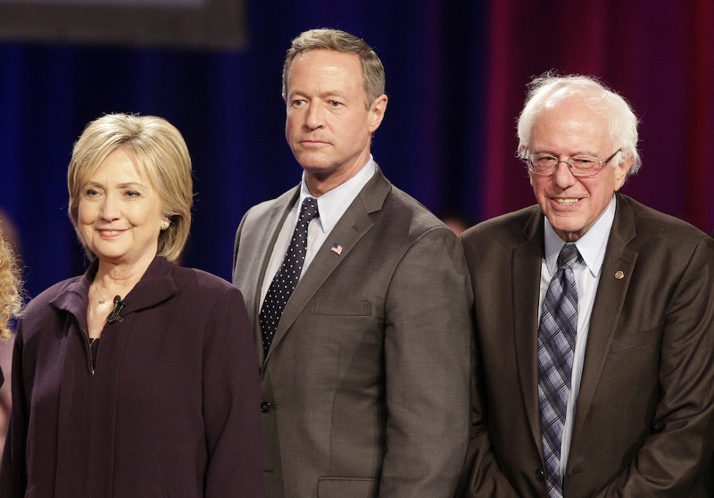 Democratic presidential candidates, Hillary Rodham Clinton, left, former Maryland Gov. Martin O’Malley, center, and Sen. Bernie Sanders, I-Vt, pose for a photo. CREDIT: AP PHOTO/CHUCK BURTON