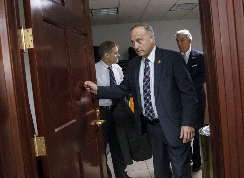 Rep. Steve King, R-Iowa, a vocal conservative in the GOP challenge to President Obama’s immigration order, emerges from a closed-door meeting with Speaker of the House John Boehner, R-Ohio, and GOP leaders, at the Capitol in Washington, Tuesday, Dec. 2, 2014. Just days before government funding expires, House Republican leaders are trying to strike a balance between the conservatives determined to stop President Barack Obamas immigration order and other lawmakers just as determined to avoid another politically damaging shutdown. (AP Photo/J. Scott Applewhite) CREDIT: AP PHOTO/J. SCOTT APPLEWHITE