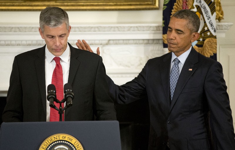 President Barack Obama and outgoing Education Secretary Arne Duncan CREDIT: AP PHOTO/PABLO MARTINEZ MONSIVAIS