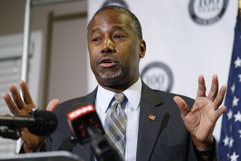 Republican presidential candidate Ben Carson gestures during a campaign stop. CREDIT: AP PHOTO/DAVID ZALUBOWSKI