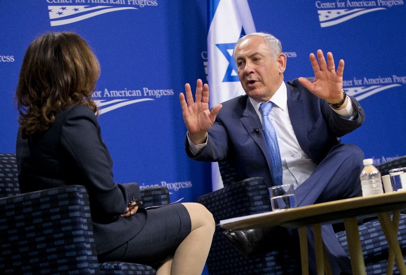 Israeli Prime Minister Benjamin Netanyahu, right, gestures as he speaks at the Center for American Progress as Neera Tanden, left, moderates, in Washington, Tuesday, Nov. 10, 2015. CREDIT: AP PHOTO/PABLO MARTINEZ MONSIVAIS