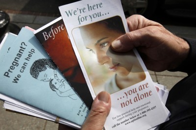 Anti-abortion pamphlets commonly found in CPC waiting rooms. CREDIT: AP Photo/Jacquelyn Martin