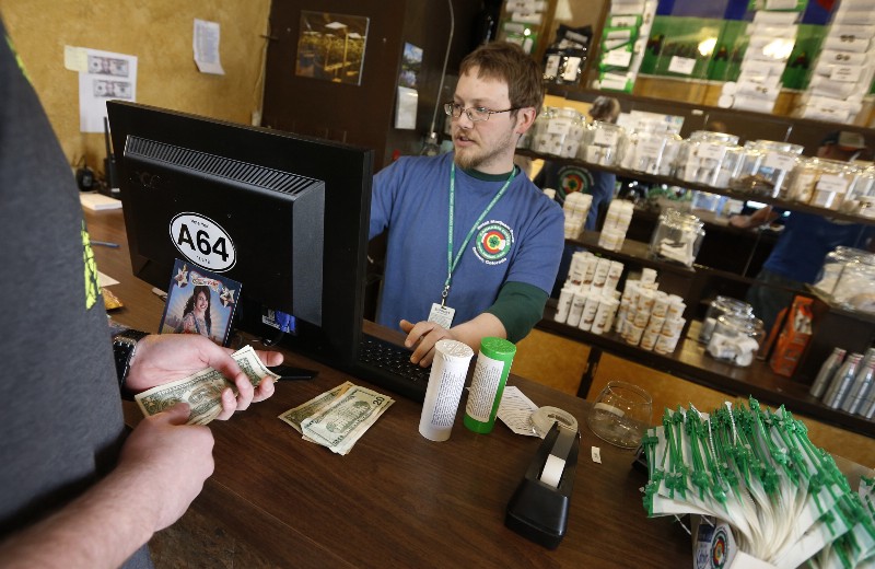 All the state revenue generated by Colorado’s marijuana industry could blow away overnight Tuesday. CREDIT: AP PHOTO/BRENNAN LINSLEY, FILE