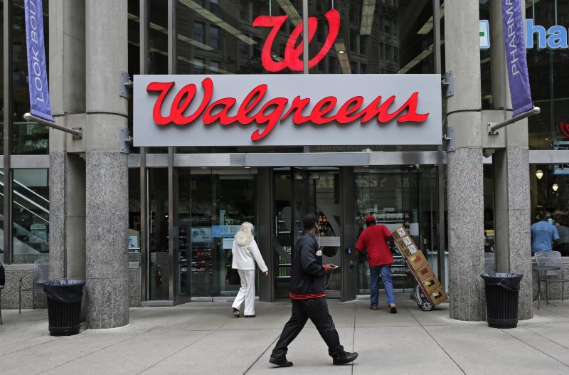 FILE — This June 4, 2014, file photo shows a Walgreens retail store in Boston. Walgreens confirmed Tuesday, Oct. 27, 2015, that it will buy rival Rite Aid, creating a drugstore giant with nearly 18,000 stores around the world. (AP Photo/Charles Krupa, File) CREDIT: CHARLES KRUPA/AP