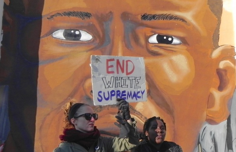 Baltimore residents challenge Bernie Sanders to address police brutality and poverty. CREDIT: Alice Ollstein