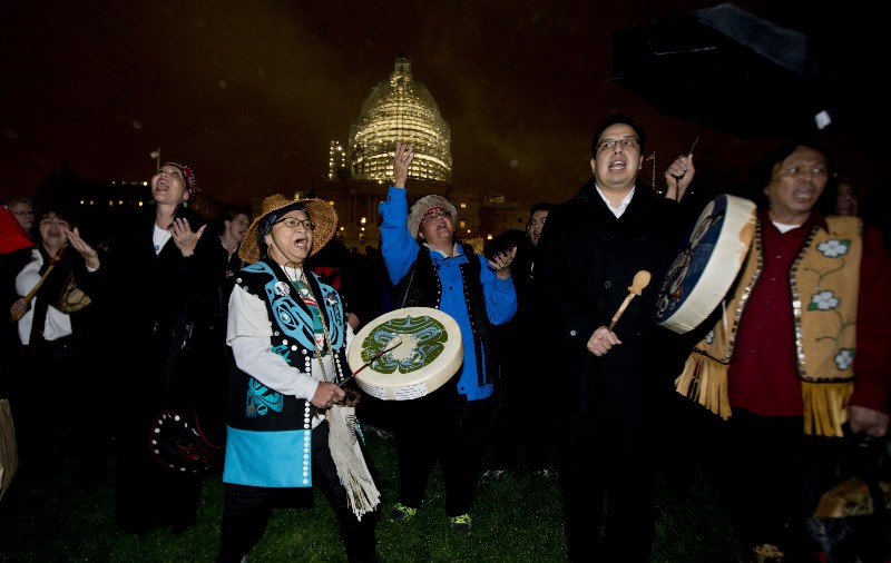 Members of the Tlingit tribe from Juneau, Alaska, and the Yaaw Tei Yi group, in Washington, Wednesday, Dec. 2, 2015, during the lighting ceremony of the U.S. Capitol Christmas tree. CREDIT: AP PHOTO, MANUEL BALCEĀ CENETA