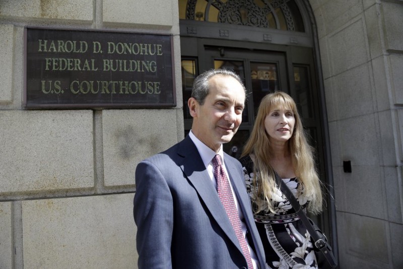 Therese Serignese and her attorney, Joseph Cammarata speak to reporters outside U.S. District Court in Worcester, Mass., Thursday, May 7, 2015. CREDIT: AP Photo/Elise Amendola