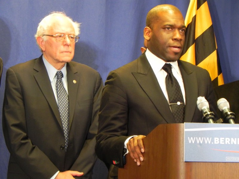 Baltimore Reverend Jamal Bryant organized a tour of Freddie Gray’s neighborhood for Sen. Bernie Sanders. CREDIT: Alice Ollstein