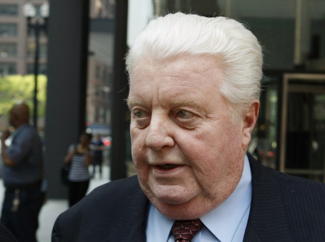 In this May 24, 2010 photo, former Chicago Police commander Jon Burge departs from the federal building in Chicago during his trial where he is accused of lying about the long-ago torture of suspects. CREDIT: AP Photo/Charles Rex Arbogast, File