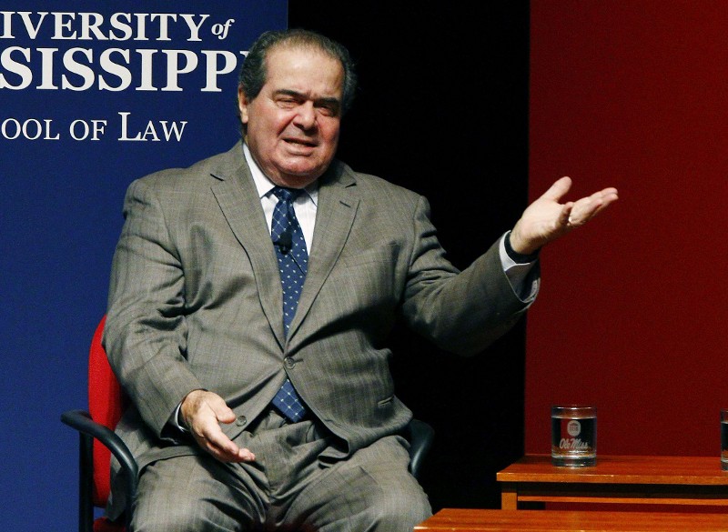 U.S. Supreme Court Justice Antonin Scalia jokes about his experiences as a law student at a program with fellow Justice Elena Kagan, Monday, Dec. 15, 2014 at the University of Mississippi. CREDIT: ROGELIO V. SOLIS, AP