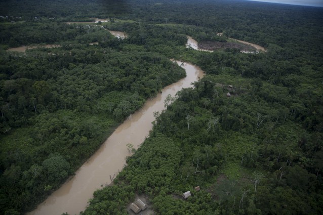 This March 16, 2015 photo shows where Ashaninka live in hamlets, along the Putaya River, in Peru’s Ucayali province. CREDIT: AP Photo/Martin Mejia