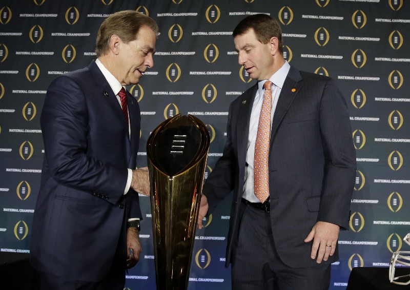 Clemson head coach Dabo Swinney and Alabama head coach Nick Saban shake hands after a news conference for the NCAA college football playoff championship game Sunday, Jan. 10, 2016, in Glendale, Ariz. (AP Photo/Chris Carlson) CREDIT: CHRIS CARLSON, AP
