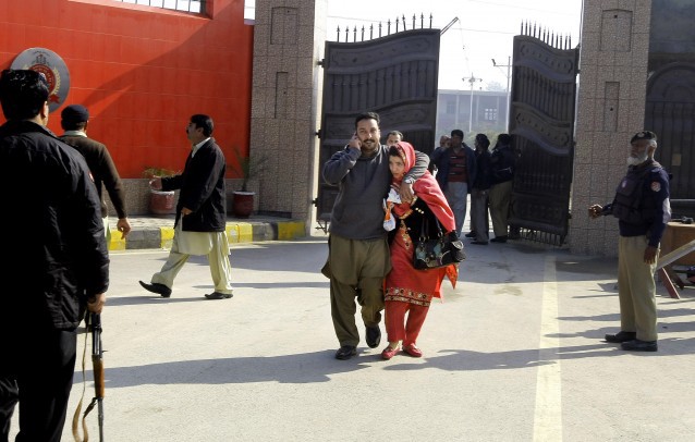 Staff of the Bacha Khan University leave the campus in Charsadda town, some 35 kilometers (21 miles) outside the city of Peshawar, Pakistan, Wednesday, Jan. 20, 2016. CREDIT: AP Photo/Mohammad Sajjad
