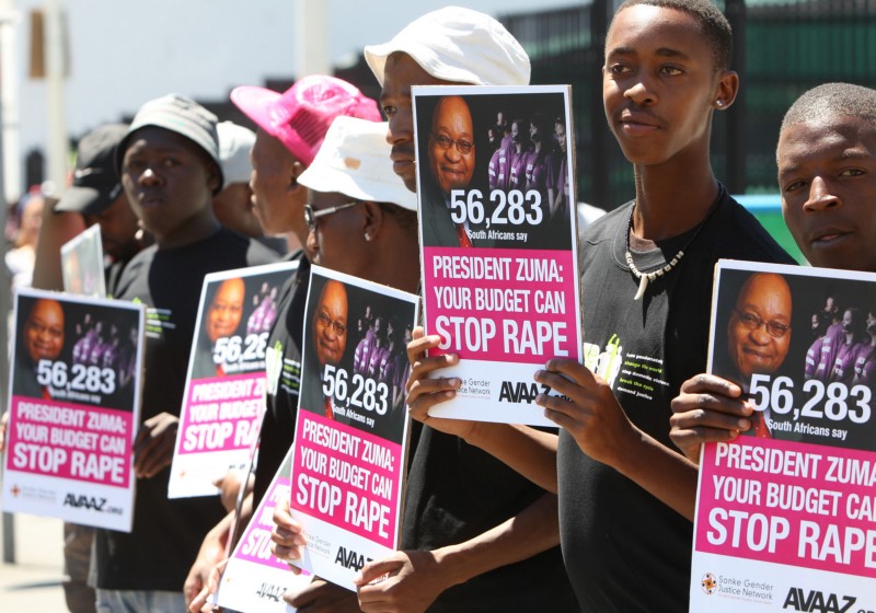 People gather near Parliament to highlight the countrys high incidence of rape and call on President Jacob Zuma to take urgent action to address this crisis while Minister of Finance Gordhan presented his budget to Parliament in Cape Town, South Africa, on Wednesday, Feb. 27, 2013. CREDIT: AP IMAGES FOR AVAAZ