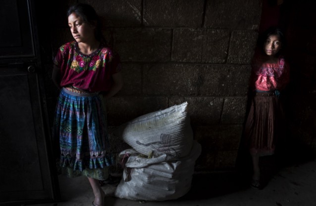 Romina Alonso Lorenzo, 12, left, and Isabel Alonso Lorenzo, eight, at their aunt’s home in Concepcion Chiquirichapa in Quetzaltenango, Guatemala, in August 2014. Romina and Isabel are two of four orphan sisters; their 14-year-old sister has recently fled to the United States where she works to help support their family. The other sisters live with their aunt in a crowded two-room home. CREDIT: Katie Orlinsky for Too Young To Wed in collaboration with Humanity United