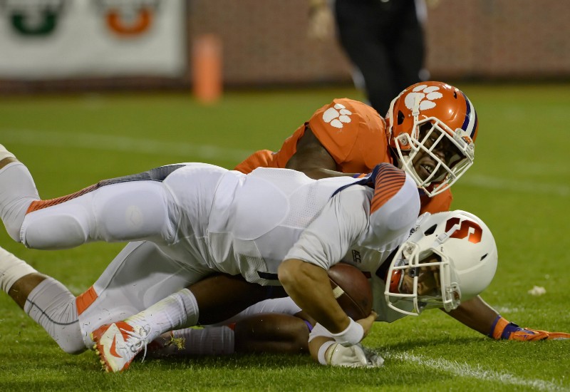 Clemson’s Stephone Anthony sacks Syracuse quarterback AJ Long during the first half an NCAA college football game in Clemson, S.C., Saturday, Oct. 25, 2014. CREDIT: RICHARD SHIRO, AP