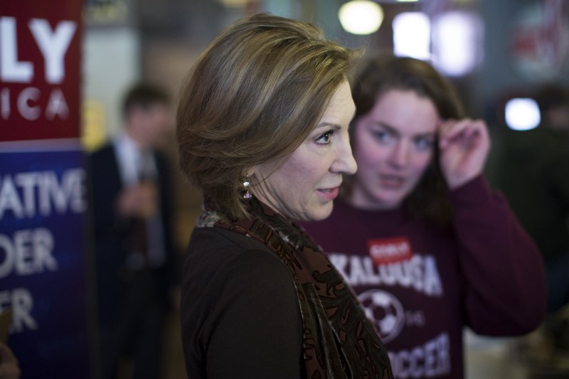 Republican presidential candidate Carly Fiorina talks with voters during a campaign stop at Smokey Row Coffee Company, on Wednesday, Jan. 27, 2016, in Oskaloosa, Iowa. CREDIT: AP PHOTO/EVAN VUCCI