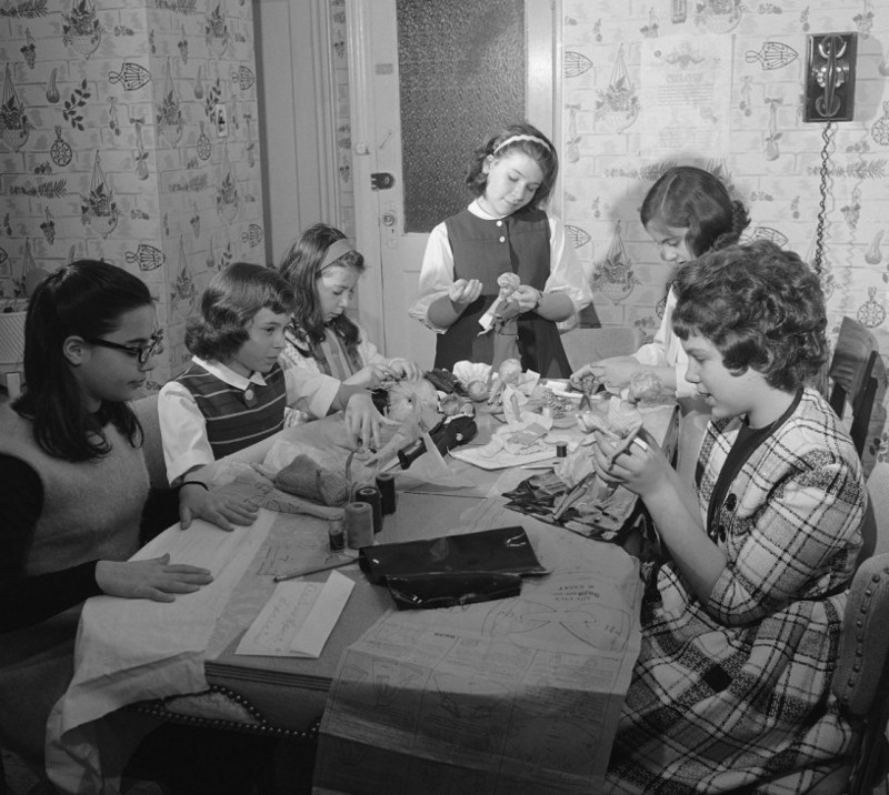 A chapter of Barbie’s fan club in Brooklyn, N.Y. preparing to give a Barbie fashion show, April 1, 1964. At the time, over 300,000 people were Barbie fan club members. CREDIT: AP Photo