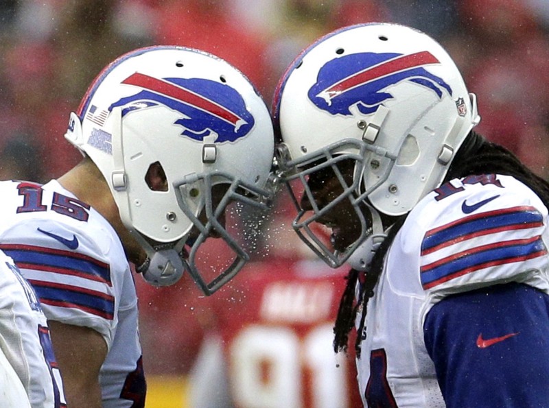 Buffalo Bills wide receiver Sammy Watkins, right, bumps helmets with wide receiver Chris Hogan (15) after scoring a touchdown during the first half of an NFL football game against the Kansas City Chiefs in Kansas City, Mo., Sunday, Nov. 29, 2015. (AP Photo/Charlie Riedel) CREDIT: CHARLIE RIEDEL, AP