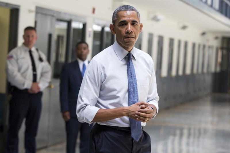 President Barack Obama pauses as he speaks at the El Reno Federal Correctional Institution in El Reno, Okla. CREDIT: AP PHOTO/EVAN VUCCI