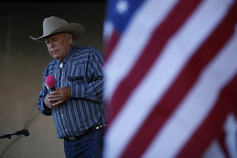 Rancher Cliven Bundy speaking to supporters in 2015. CREDIT: AP PHOTO/JOHN LOCHER