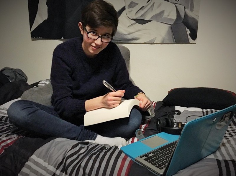 Harper Zacharias studying in their dorm room. CREDIT: courtesy of Harper Zacharias