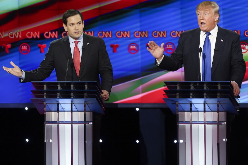 Republican presidential candidate, Sen. Marco Rubio, R-Fla, left, and Republican presidential candidate businessman, Donald Trump, talk over each other as they answer a question during the Republican Presidential Primary Debate at the University of Houston Thursday, Feb. 25, 2016. (AP Photo/Houston Chronicle, Gary Coronado, Pool) MANDATORY CREDIT CREDIT: GARY CORONADO, AP