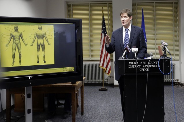 Milwaukee County District Attorney John Chisholm speaks at news conference Monday, Dec. 22, 2014, in Milwaukee. Chisholm announced that there would be no charges against former police office Christopher Manney in the fatal shooting of Dontre Hamilton. CREDIT: AP Photo/Morry Gash