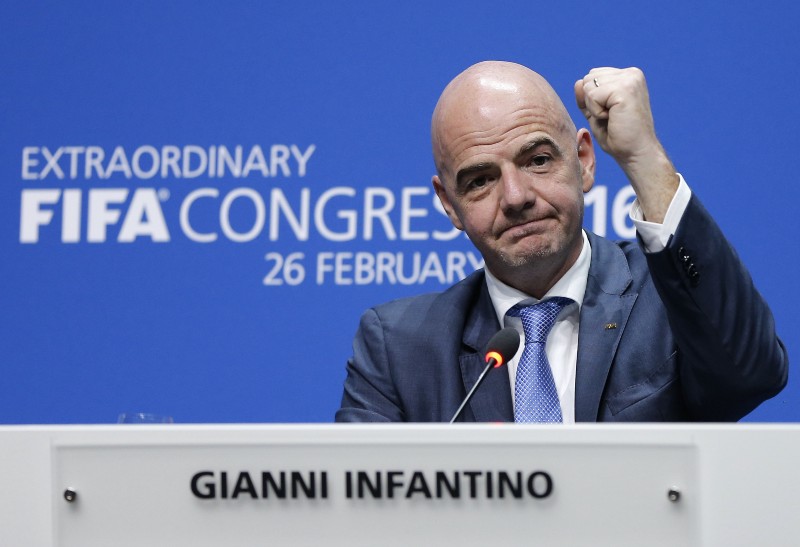 Newly elected FIFA president Gianni Infantino of Switzerland raises an arm during a press conference after the second election round during the extraordinary FIFA congress in Zurich, Switzerland, Friday, Feb. 26, 2016. Delegates of the soccer body FIFA met to elect a new president. CREDIT: MICHAEL PROBST, AP