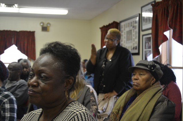 Patty Wilson listens as the president of the local NAACP praises the mothers. CREDIT: Kira Lerner