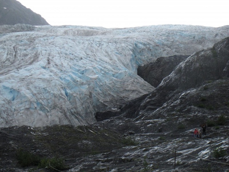 Tourists walk to Exit Glacier in Kenai Fjords National Park just outside Seward, Alaska. Global warming is carving measurable changes into Alaska and other areas in the northern west coast of the United States. CREDIT: AP Photo/Mark Thiessen