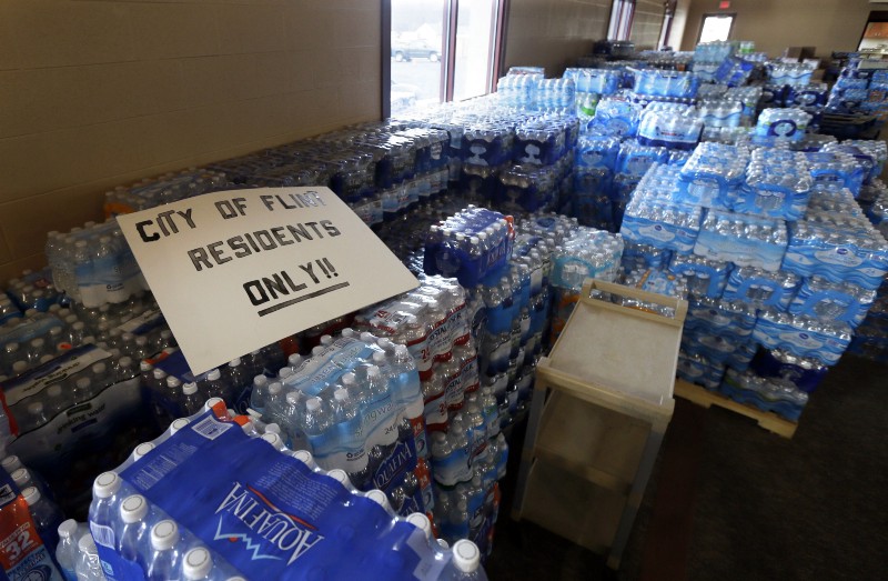 Hundreds of cases of bottled water are stored at Our Lady of Guadalupe Church, Friday, Feb. 5, 2016 in Flint, Mich. Michigan. CREDIT: AP PHOTO, CARLOS OSORIO
