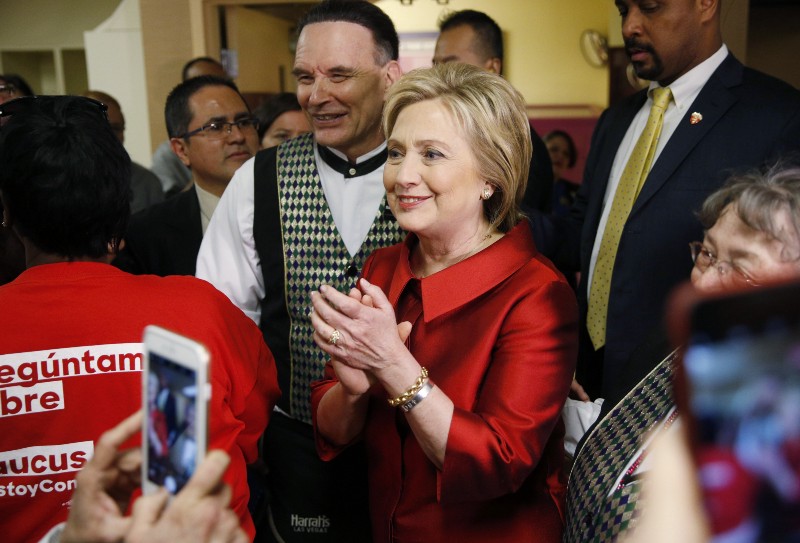 Democratic presidential candidate Hillary Clinton visits with Harrah’s Las Vegas employees on the day of the Nevada Democratic caucus, Saturday, Feb. 20, 2016, in Las Vegas. CREDIT: AP PHOTO/JOHN LOCHER