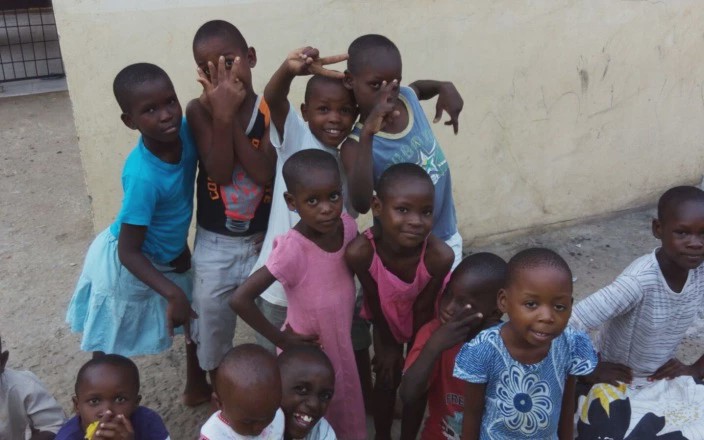 Some of the children who live in Okoa Sasa’s safe house pose for a photo. CREDIT: COURTESY OF OKOA SASA