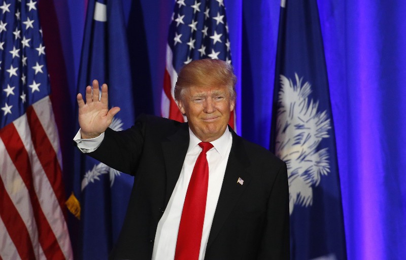 Republican presidential candidate Donald Trump speaks during a South Carolina Republican primary night event, Saturday, Feb. 20, 2016 in Spartanburg, S.C. Trump is the winner in the South Carolina Republican primary. CREDIT: AP PHOTO/PAUL SANCYA