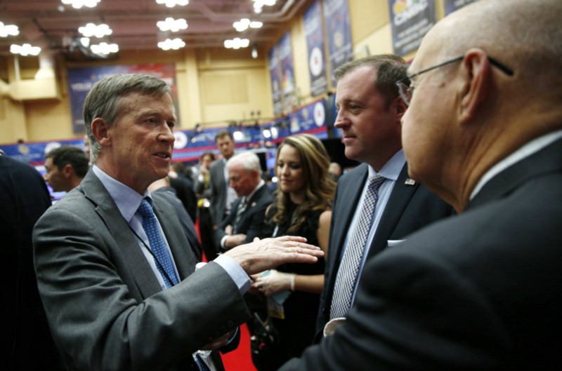 Dean Parker (center) resigned as Carson’s campaign finance chair last month amid criticisms of his spending and fees CREDIT: AP PHOTO/BRENNAN LINSLEY