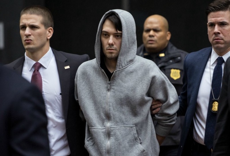 On Thursday, Dec. 17, 2015, Shkreli is escorted by law enforcement agents in New York after being taken into custody following a securities probe. CREDIT: AP Photo/Craig Ruttle/File