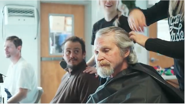 Homeless clients at Mandie Barnes’s free haircuts event in December 2015 CREDIT: YOUTUBE/CIRCA3