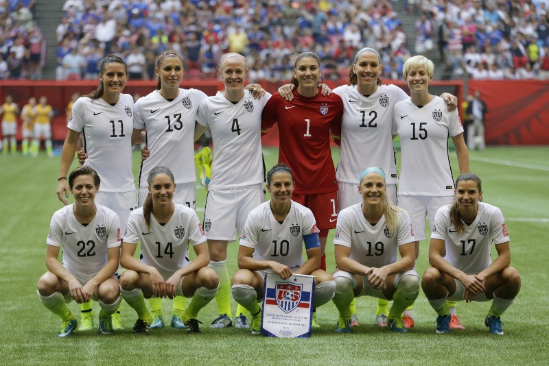 The United States Women’s National Team poses for the traditional team photo before beating Japan 5–2 in the the FIFA Women’s World Cup soccer championship in Vancouver, British Columbia, Canada, Sunday, July 5, 2015. CREDIT: ELAINE THOMPSON, AP