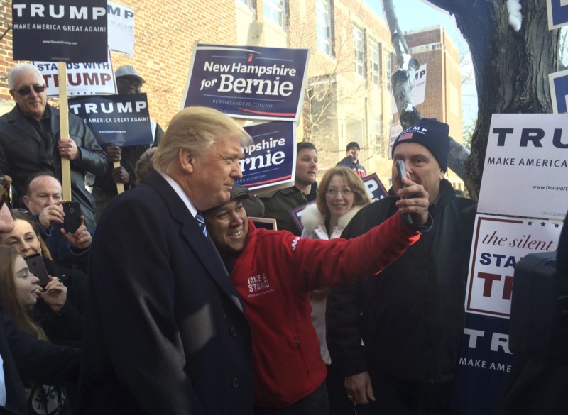 Donald Trumps poses for a photo at Webster Elementary School in Manchester, N.H., Tuesday, Feb. 9, 2016. CREDIT: AP PHOTO/JILL COLVIN