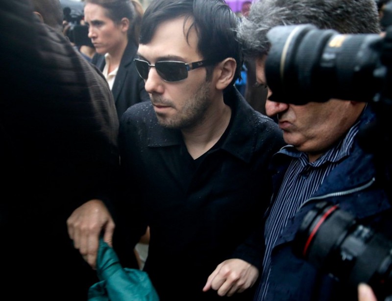 Martin Shkreli leaves the courthouse after his arraignment in New York, Thursday, Dec. 17, 2015.