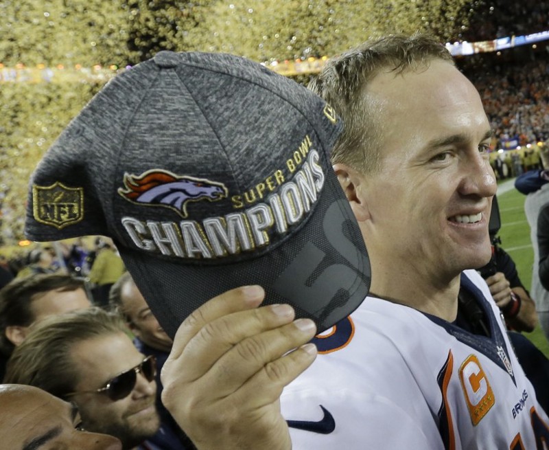 Peyton Manning celebrates after winning Super Bowl 50. CREDIT: David J. Phillip, AP