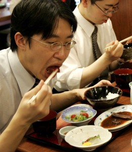 Japanese businessmen enjoy their whale meat lunches at a whale meat eatery in Tokyo. CREDIT: AP Photo/Katsumi Kasahara