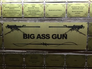 Plaques on the wall of people who support conservative radio host Michael Berry’s Redneck Country Club in Stafford, Texas. The “Big ass gun” donors are the people who have given the most. CREDIT: Emily Atkin