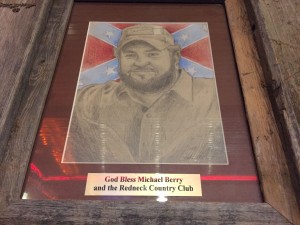 A drawing of conservative radio host Michael Berry over the Confederate flag is displayed at the Redneck Country Club in Stafford, Texas CREDIT: Emily Atkin